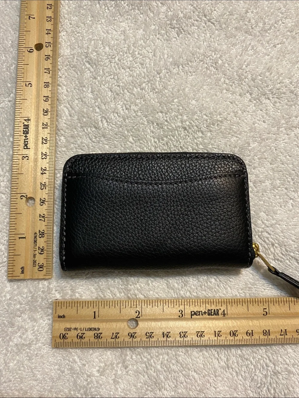 Coach Black Pebbled Leather Zip Card Holder with Gold 'C' Accent